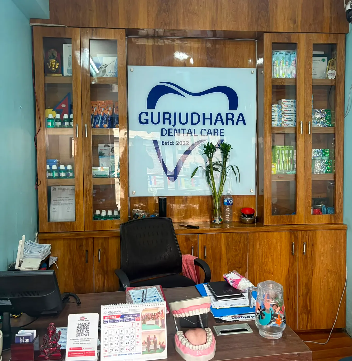 Reception desk and branded counter at Gurjudhara Dental Care, Chandragiri-12, Kathmandu