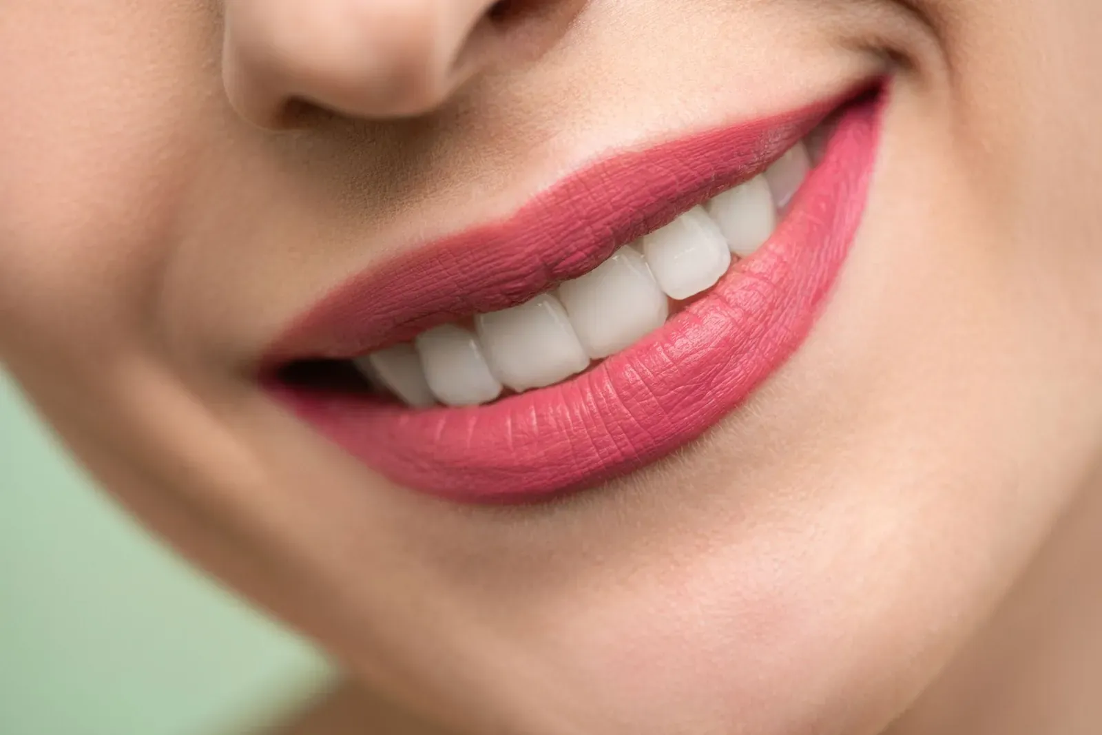 Close-up of an even white smile after cosmetic smile makeover treatment